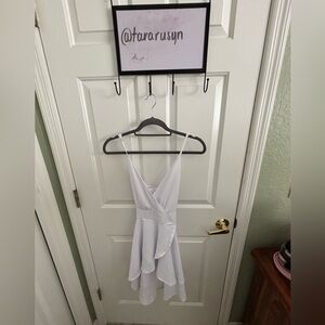 White low cut flowy dress with straps